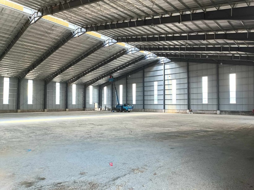 Steel roof and interior of the Vision Feed Mills warehouse construction project in Rosario, Batangas